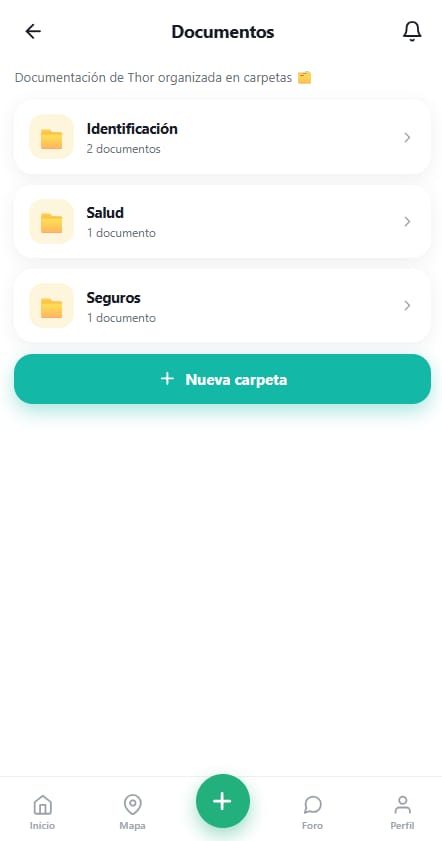 Documentos de la mascota organizados en carpetas de identificación, salud y seguros